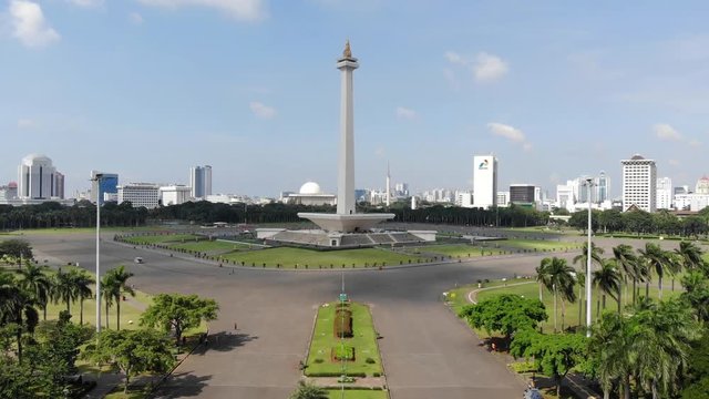 Aerial view clip of National Monument or also known as Monas, located in Jakarta, the capital city of Indonesia, recorded in 4k resolution.