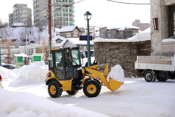 除雪車　作業員　雪