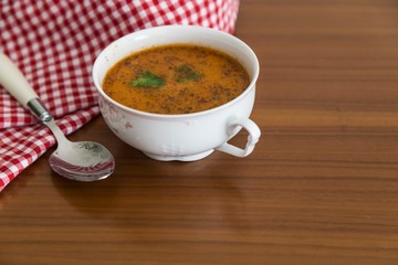  bowl of soup on wood background