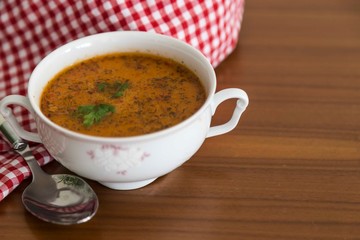 bowl of soup on wood background