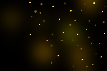 Fototapeta na wymiar Gold stars bokeh overlay, stars photo overlay, abstract background, shiny gold and yellow stars flowing around. Photo overlay effect, stars bokeh on black background, JPG file.