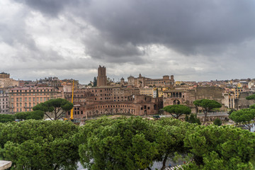 Fototapeta na wymiar View above downtown of Rome, Italy. Beautiful city view beafore rain