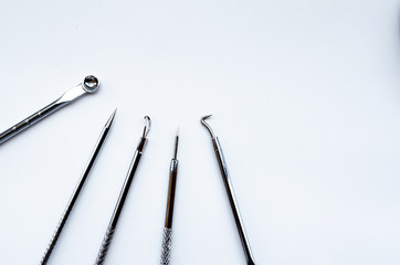  tools for removing black spots and acne on the skin for white background.