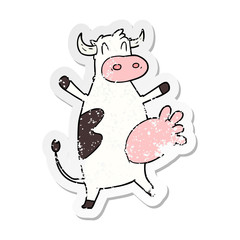 distressed sticker of a cartoon cow swinging udder