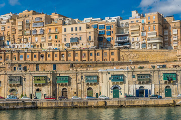 View on Valletta with its architecture from the sea on the boat