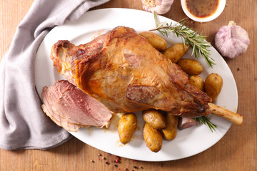 grilled lamb leg and potatoes