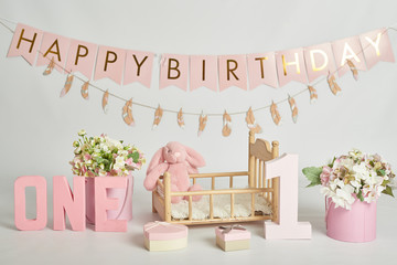pink decoration for the first year photo session cake smash