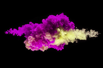 Coloured acrylic ink mixing in water on black