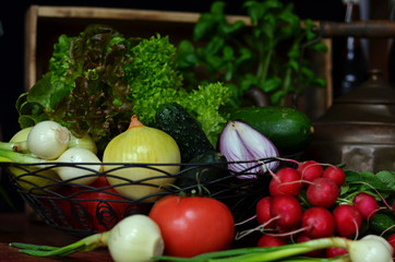 Fresh vegetables in a metal basket