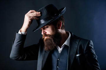 Designing new clothes. Bearded man gentleman. Detective in hat. Mature hipster with beard. Secret shy. Male formal fashion. brutal caucasian hipster with moustache. Businessman in suit