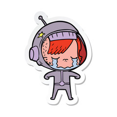 sticker of a cartoon crying astronaut girl