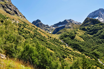 Naklejka na ściany i meble Closeup mountains scenes in national park Dombai, Caucasus, Russia