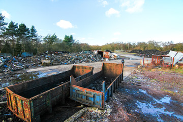 Large dumpsters (or garbage containers or rubbish skips) at the abandoned Furber's Scrapyard in...