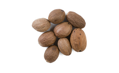 nutmeg heap isolated on white background. top view