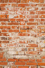 Naklejka premium Wall of old red brick. Can be used as background or texture