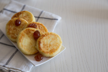Cottage cheese pancakes, homemade traditional Ukrainian and Russian syrniki. Healthy Breakfast/