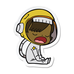 sticker of a cartoon talking astronaut