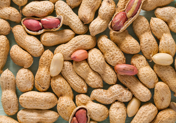 peanuts on wooden surface