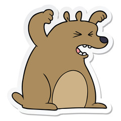 sticker of a cartoon roaring bear