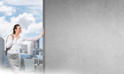 Fototapeta premium Woman and concrete empty banner