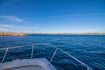 Amazing blue waters of the Mediterranean Sea near Malta near blue grotto from a boat