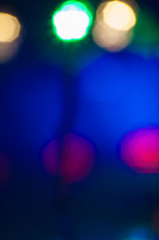 Festive background with place for text. Christmas garland multicolored bokeh lights