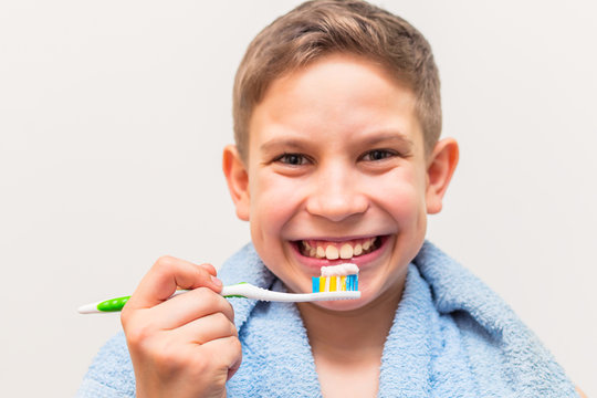 Teen Boy Brushing His Teeth