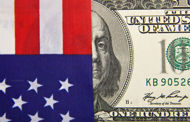 dollars on usa flag as background