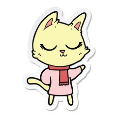 sticker of a calm cartoon cat wearing scarf