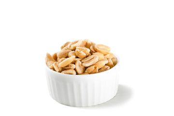 Salted roasted peanuts isolated on white background.
