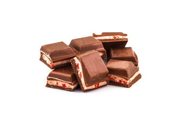 Pieces of chocolate bar isolated on white
