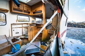 Looking into a wrecked RV (trailer) at an abandoned scrapyard in Shropshire, England.