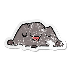 distressed sticker of a cartoon rock