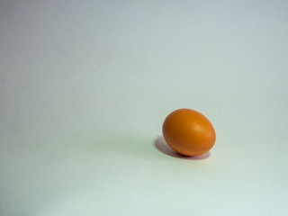 Eggs of brown color prepare for Easter on a light background