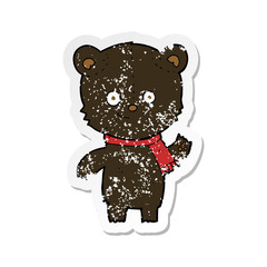retro distressed sticker of a cartoon black bear waving