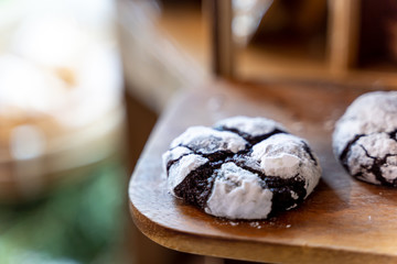 Chocolate Crinkle Cookies in powdered sugar, Cracked chocolate biscuits. Chocolate biscuits. Christmas cookies..