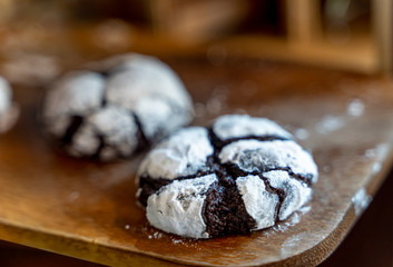 Chocolate Crinkle Cookies in powdered sugar, Cracked chocolate biscuits. Chocolate biscuits. Christmas cookies..