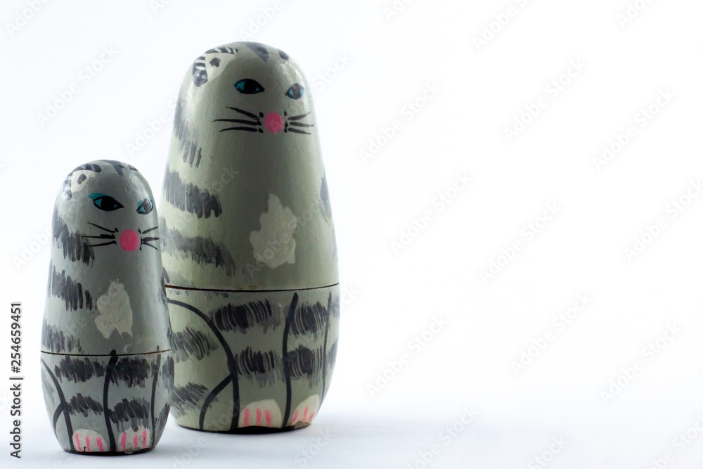 Wall mural Matryoshka cats doll set isolated on a white background