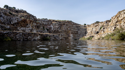 quarry open at Alcántara (Spain) with a small beach for swimming