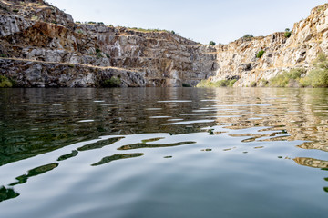 quarry open at Alcántara (Spain) with a small beach for swimming