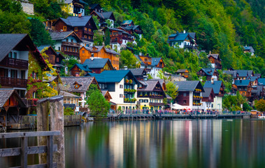 Scenery of colorful buildings on the mountain slope by the lake in Hallstatt,Austria