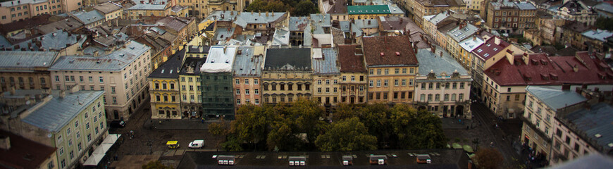 Fototapeta premium panoramic view of old european city, top view banner of architecture