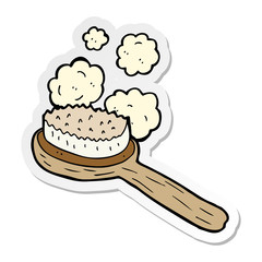 sticker of a cartoon old brush