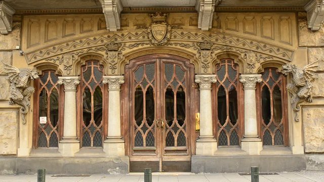 Turin, Piedmont region, Italy. October 2018. The fascinating and mysterious Victoria house, commonly home to dragons. Fixed framing of the splendid entrance door