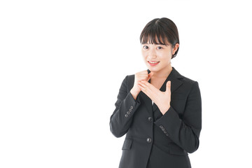 ガッツポーズをするビジネスウーマン