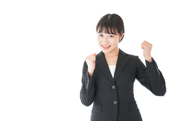 ガッツポーズをするビジネスウーマン