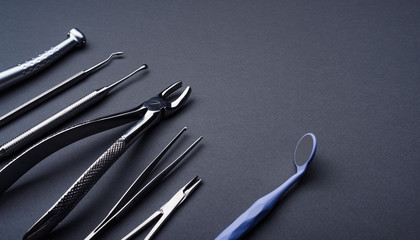 Dental instruments composed on gray background