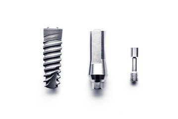 Set of medical implantation screw tools isolated on white background