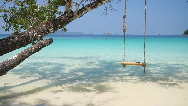 swing hang on big tree over beach sea, Nyaung Oo Phee, Myanmar, Lockdown.