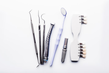 Dental surgery equipment on white table